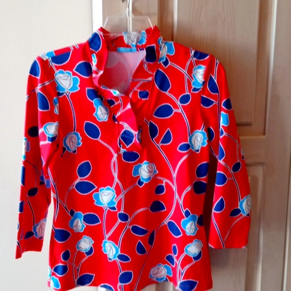 J McLaughlin orange, blue and white top with ruffle.  Machine washable.